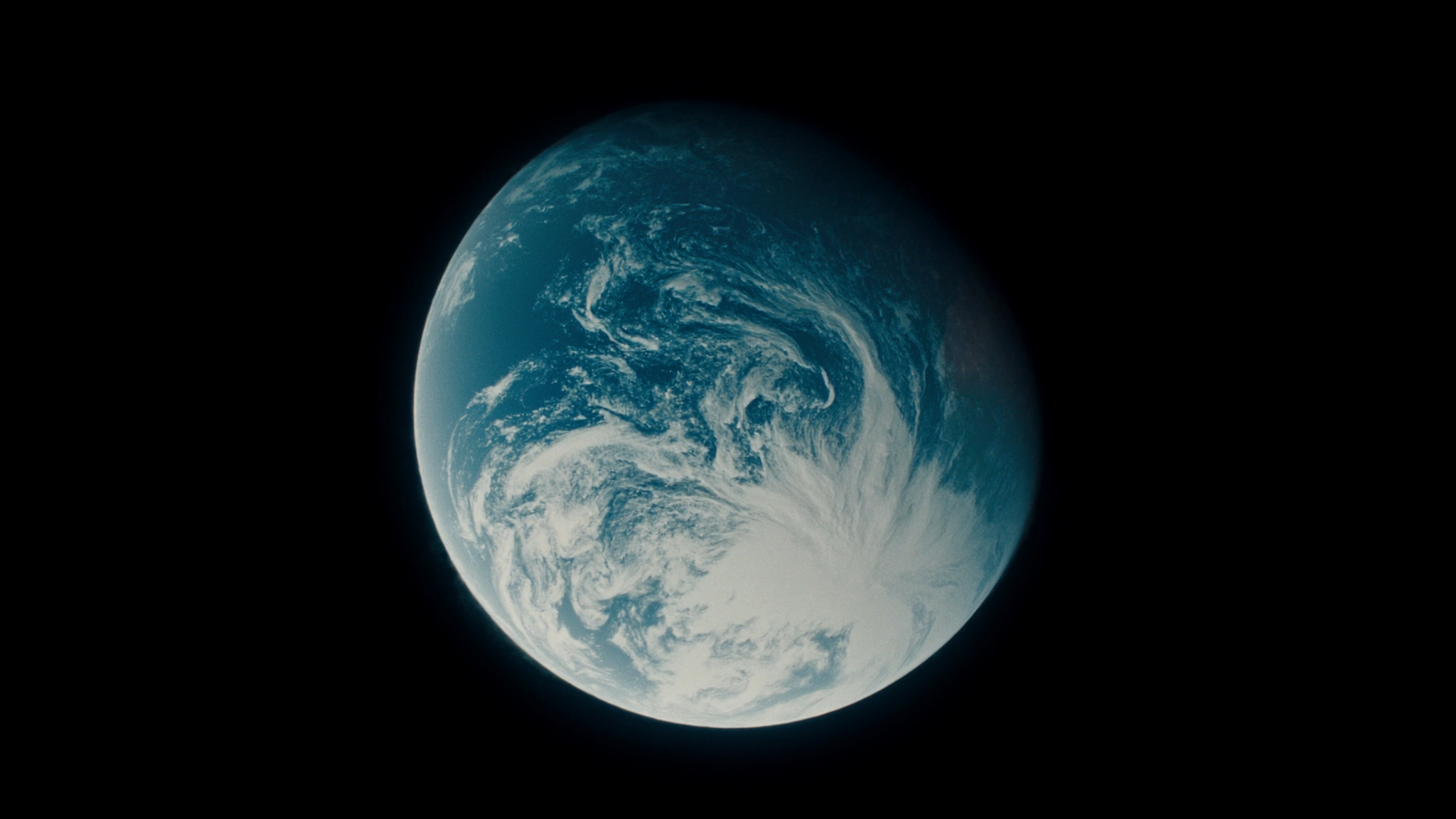 Earth suspended against deep black space